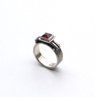 ring with rails and garnet profile.jpg